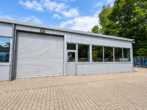 Halle Ansicht rechts - Repräsentative Gewerbeimmobilie auf großzügigem Grundstück – vermietet bis 2030 – HS 4232